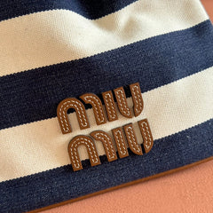 MIUMIU 26S BUCKET BAG 23 IN CREAM AND NAVY BLUE CANVAS GOLD HARDWARE