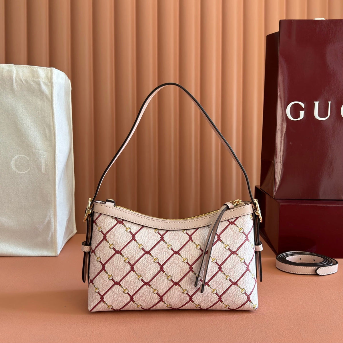 GUCCI 26S GG EMBLEM BUCKET BAG 22 IN LIGHT PINK COATED FABRIC