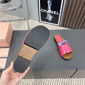 SLIPPERS IN PINK GLOSSY CALFSKIN WITH PURPLE HALF-FOOT SOCKS