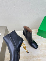 KNOT ANKLE BOOT IN BLACK CALFSKIN WITH GOLD METAL HEEL 9 CM