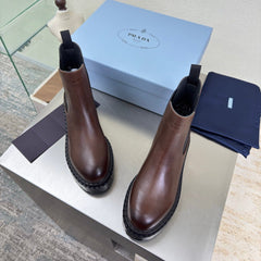 PRADA 25S PLATFORM CHELSEA BOOTS IN DARK BROWN CALFSKIN