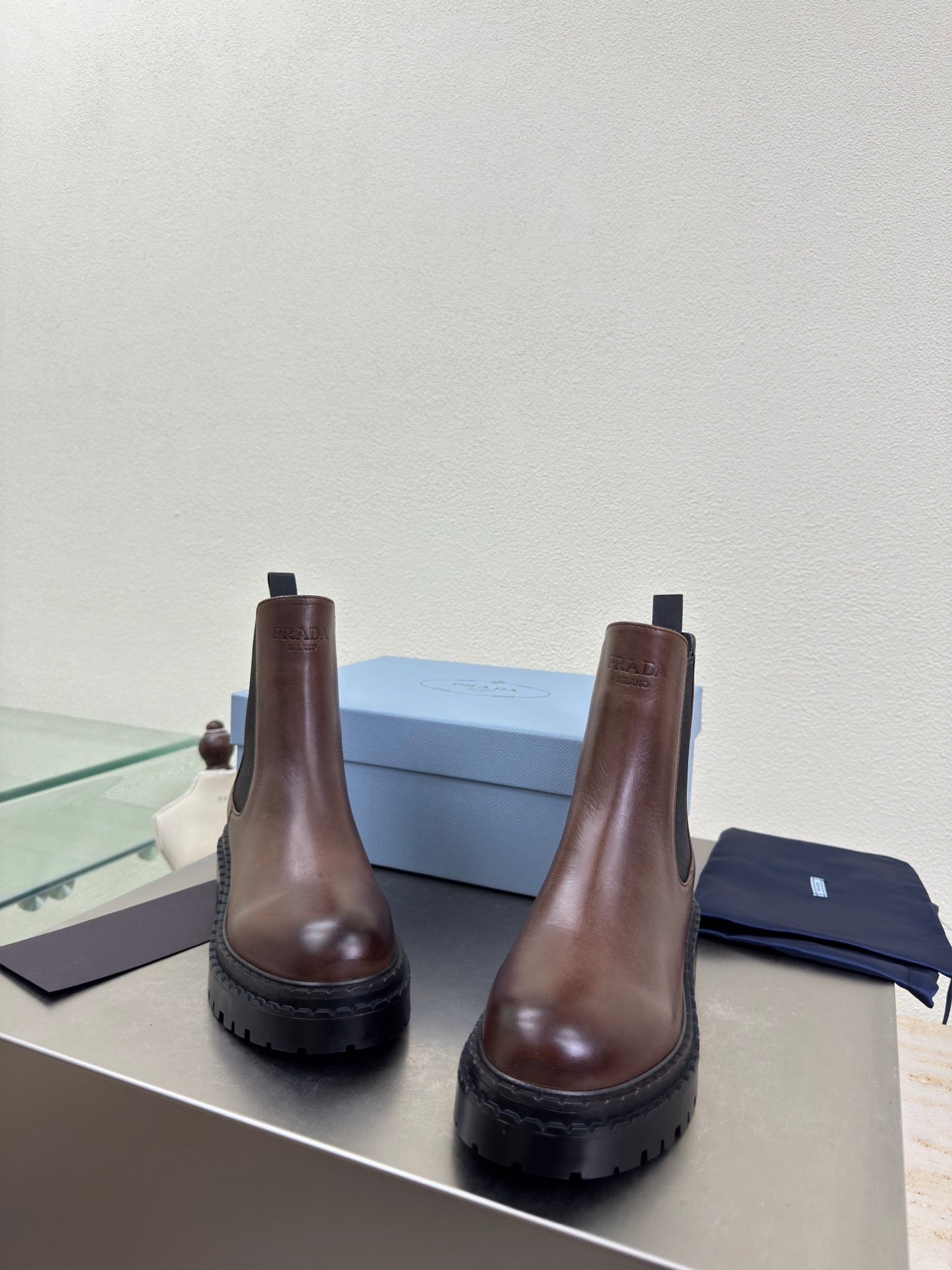 PRADA 25S PLATFORM CHELSEA BOOTS IN DARK BROWN CALFSKIN