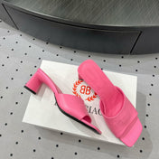 SQUARE-TOE MEDIUM HEEL MULES IN PINK CALFSKIN LOGO EMBOSSED