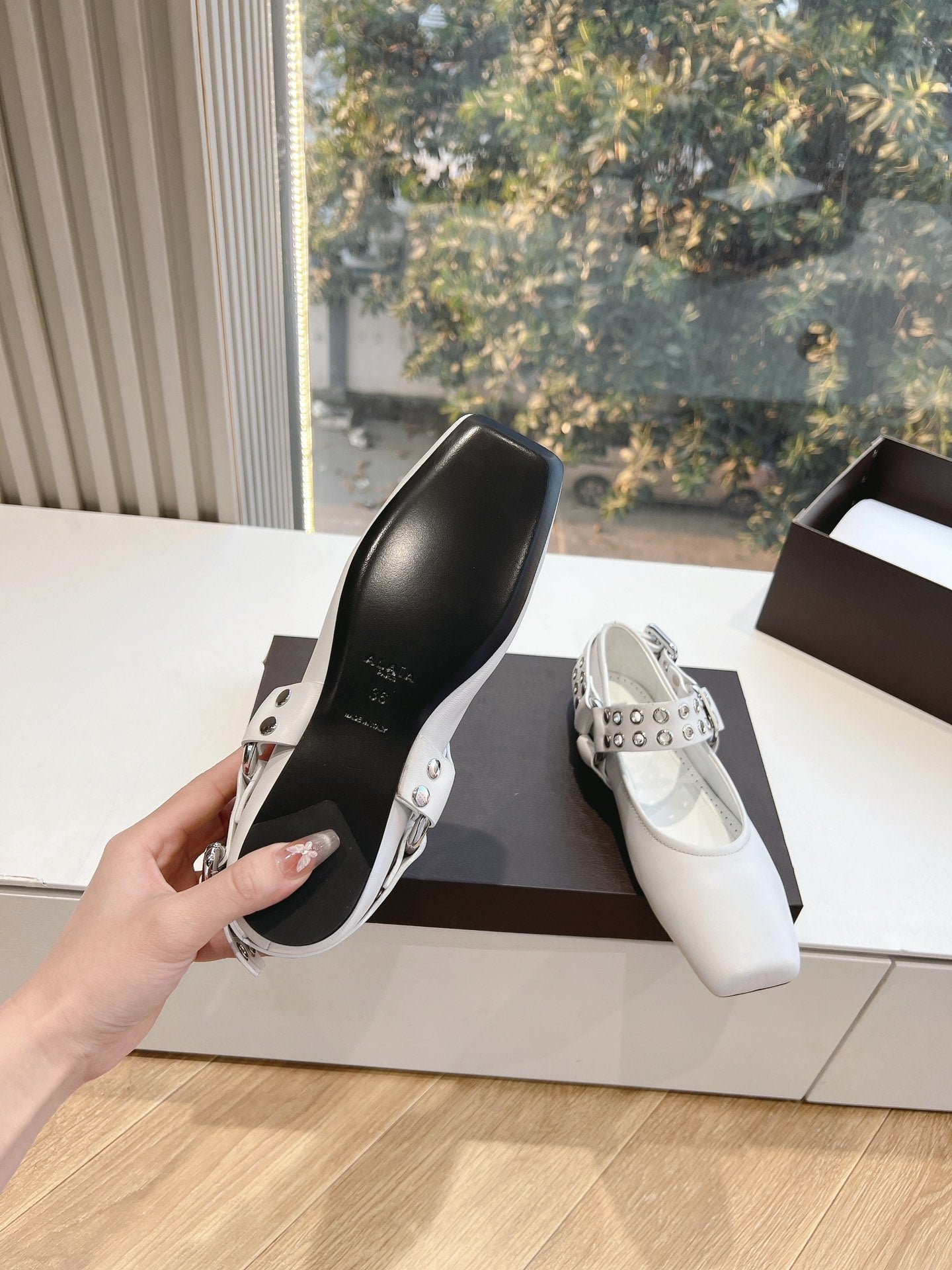 ALAIA 26S FLATS IN WHITE CALFSKIN WITH SILVER STUD STRAP