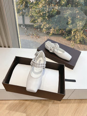 ALAIA 26S FLATS IN WHITE CALFSKIN WITH SILVER STUD STRAP