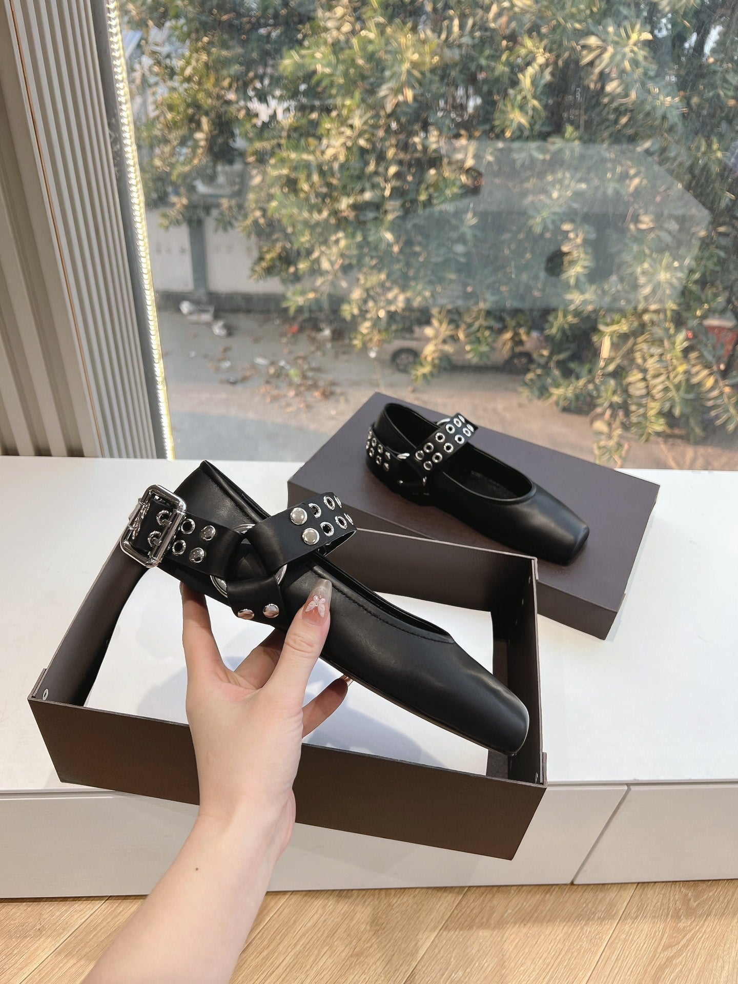 ALAIA 26S FLATS IN BLACK CALFSKIN WITH SILVER STUD STRAP