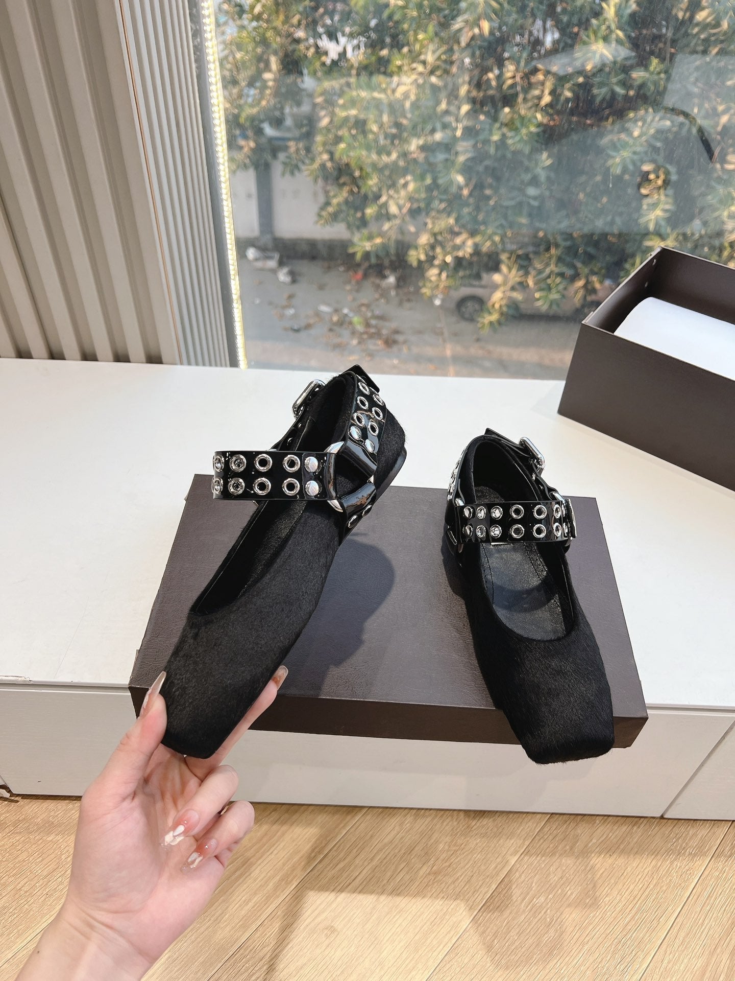 ALAIA 26S FLATS IN BLACK PONY HAIR WITH SILVER STUD STRAP