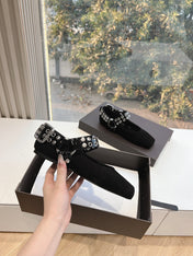 ALAIA 26S FLATS IN BLACK SUEDE WITH SILVER STUD STRAP