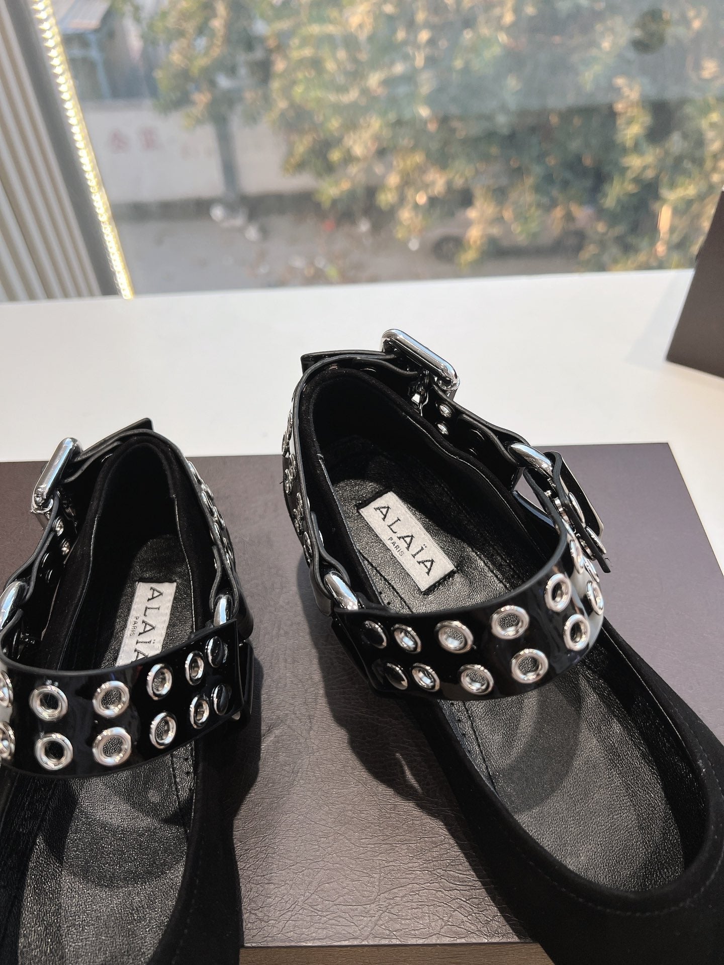 ALAIA 26S FLATS IN BLACK SUEDE WITH SILVER STUD STRAP