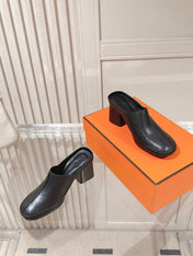 HM 26S HEEL MULES 65 MM IN BLACK CALFSKIN