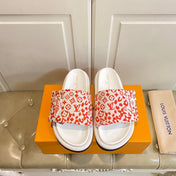 LV 26S PILLOW COMFORT MULES IN WHITE AND ORANGE CANVAS