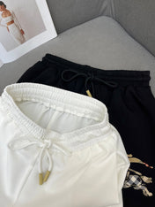 COTTON SHORTS WITH SIGNATURE EMBROIDERY