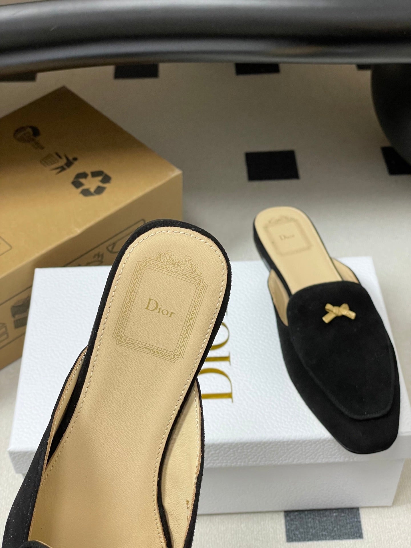 DIOR 26S MULES IN BLACK SUEDE WITH BOW