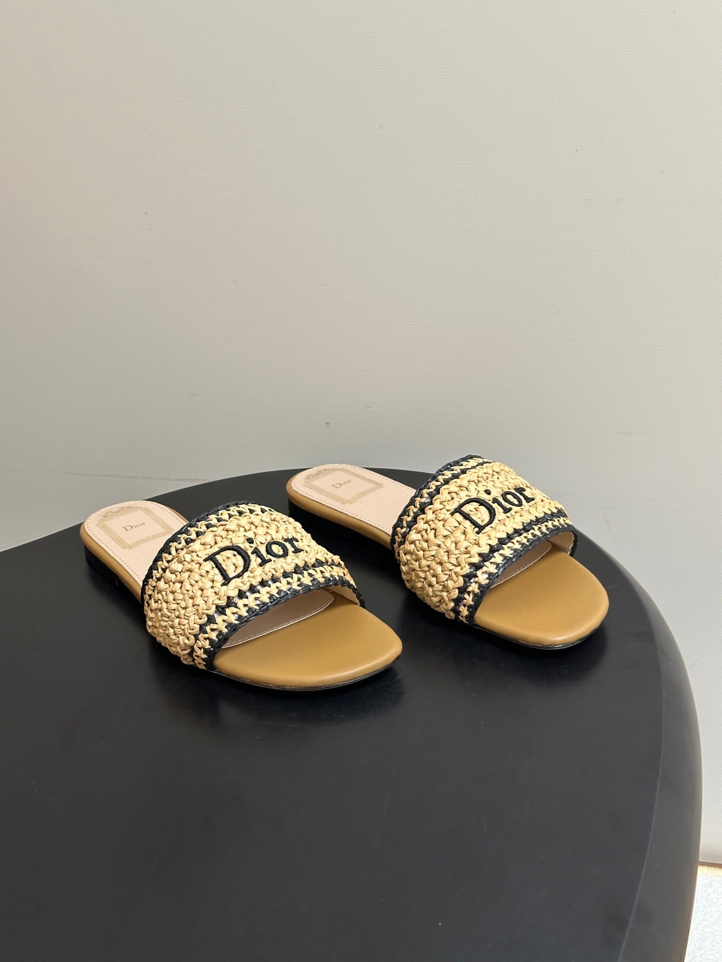 DIOR 26S FLAT SLIDE SANDALS IN BEIGE RAFFIA