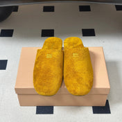MIUMIU 26S MULE LOAFERS IN OCHRE YELLOW SUEDE LOGO