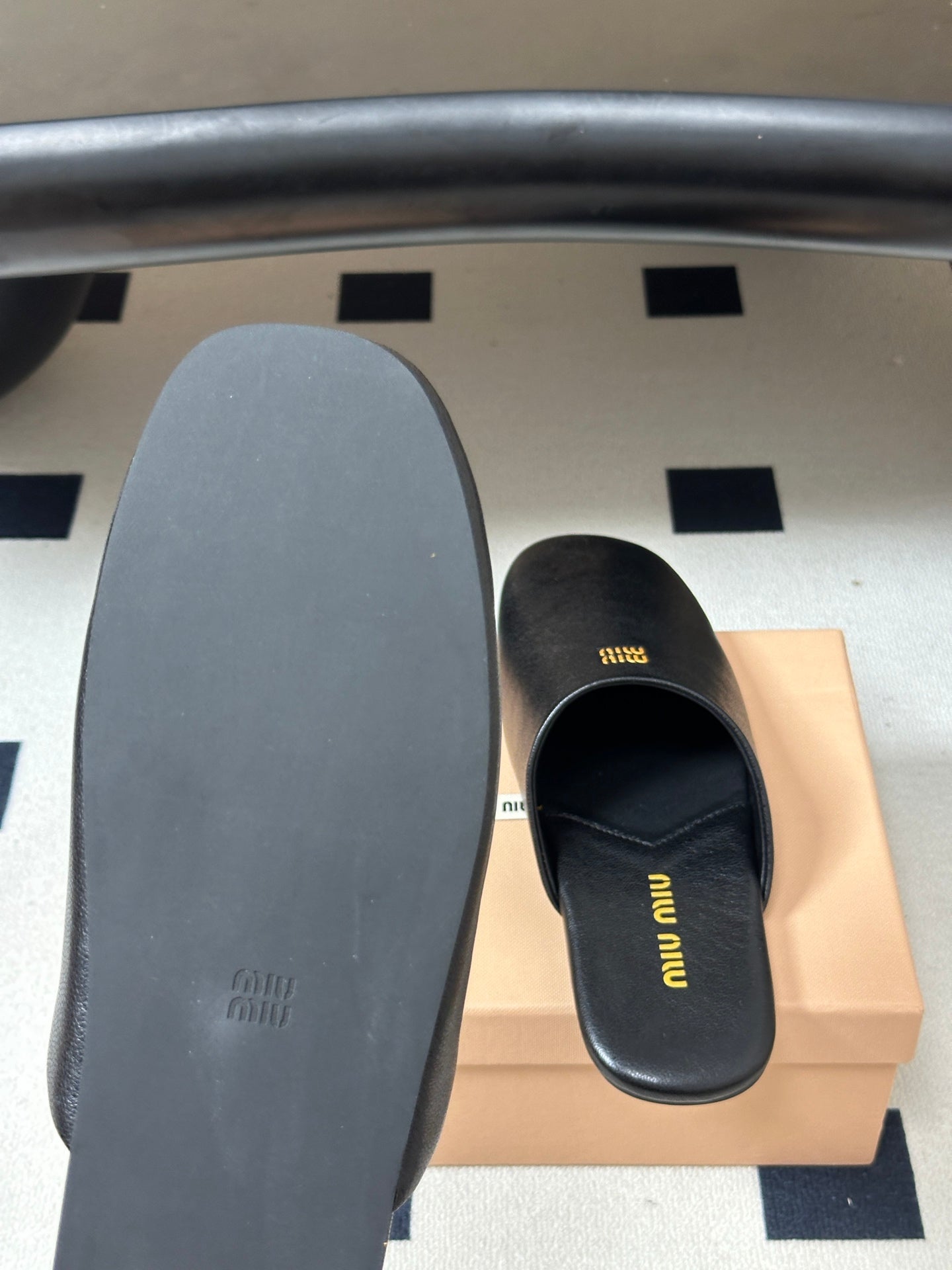 MIUMIU 26S MULE LOAFERS IN BLACK CALSKIN