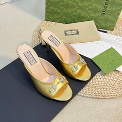 GG  Women's Horsebit mid-heel slide sandal in Gold