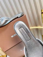 SLIDES SANDALS IN SILVER PATENT CALFSKIN BOW IN TRAP