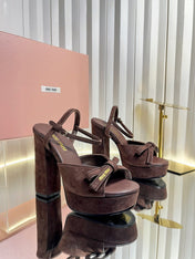 MIUMIU 26S PLATFORM ANKLE STRAP SANDALS 120MM IN DARK BROWN SUEDE WITH BOW