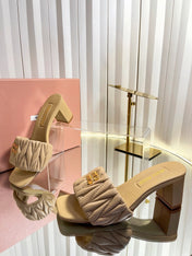 MIUMIU 26S PADDED MATELASSE MULE HEELS 65MM IN BEIGE CALFSKIN GOLD HARDWARE