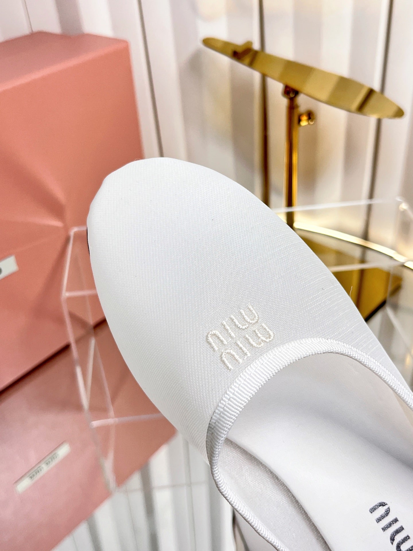 MIUMIU 26S FLAT MULES IN WHITE FABRIC AND LEATHER