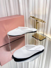 MIUMIU 26S FLAT MULES IN WHITE FABRIC AND LEATHER