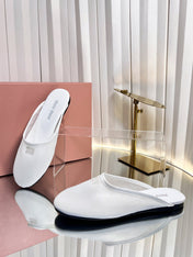 MIUMIU 26S FLAT MULES IN WHITE FABRIC AND LEATHER