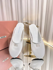 MIUMIU 26S FLAT MULES IN WHITE FABRIC AND LEATHER