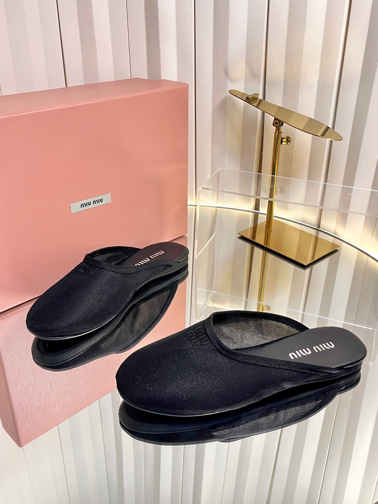 MIUMIU 26S FLAT MULES IN BLACK FABRIC AND LEATHER 