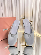 MIUMIU 26S FLAT MULES IN GREY FABRIC AND LEATHER