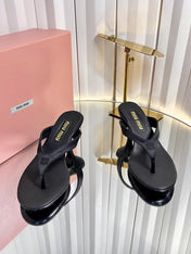 MIUMIU 26S THONG HEELED SANDALS 50 MM IN BLACK LAMBSKIN AND SATIN