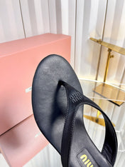 MIUMIU 26S THONG HEELED SANDALS 50 MM IN BLACK LAMBSKIN AND SATIN
