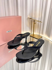 MIUMIU 26S THONG HEELED SANDALS 50 MM IN BLACK LAMBSKIN AND SATIN