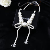 CHANEL 25S CHAIN BELT IN WHITE PEARL WITH BOW 614475