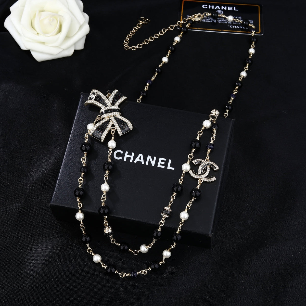 CHANEL 25S CHAIN BELT IN BLACK AND WHITE PEARL 614285