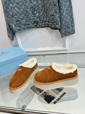 TRIANGLE LOGO MULES IN BRONZE BROWN SUEDE AND SHEARLING LINING