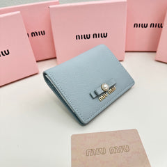 SMALL WALLET 11 IN BLUE PASTEL CALFSKIN