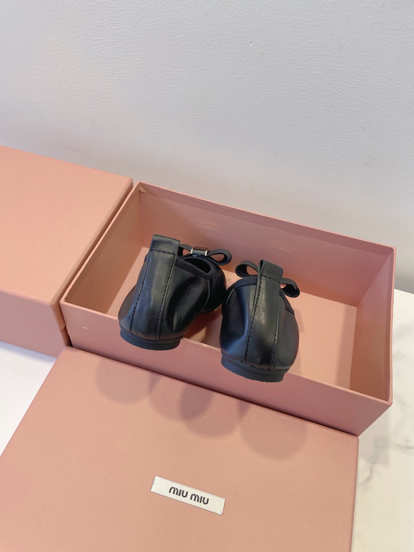 MIUMIU 26S BALLET FLATS IN BLACK CALFSKIN WITH BOW