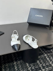 CHANEL 26S FLAT SLINGBACK IN WHITE AND BLACK POINTED-TOE LAMBSKIN