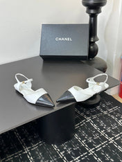 CHANEL 26S FLAT SLINGBACK IN WHITE AND BLACK POINTED-TOE LAMBSKIN