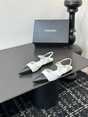 CHANEL 26S FLAT SLINGBACK IN WHITE AND BLACK POINTED-TOE LAMBSKIN
