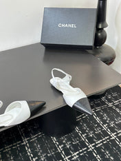 CHANEL 26S FLAT SLINGBACK IN WHITE AND BLACK POINTED-TOE LAMBSKIN