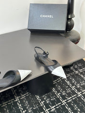 CHANEL 26S FLAT POINTED-TOE SLINGBACKS  IN BLACK AND WHITE LAMBSKIN