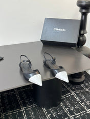 CHANEL 26S FLAT POINTED-TOE SLINGBACKS  IN BLACK AND WHITE LAMBSKIN