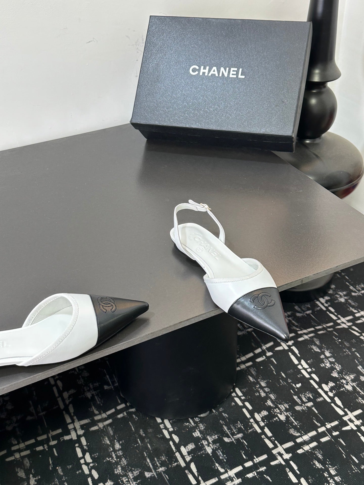 CHANEL 26S POINTED-TOE SLINGBACKS IN WHITE AND BLACK LAMBSKIN