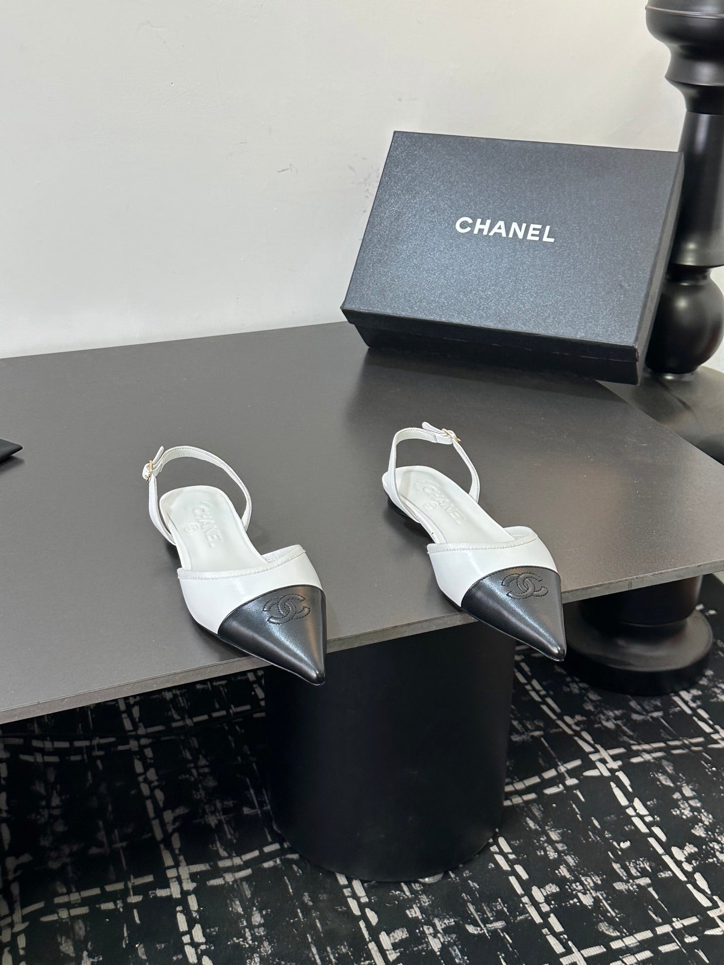 CHANEL 26S POINTED-TOE SLINGBACKS IN WHITE AND BLACK LAMBSKIN