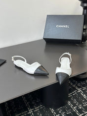 CHANEL 26S POINTED-TOE SLINGBACKS IN WHITE AND BLACK LAMBSKIN