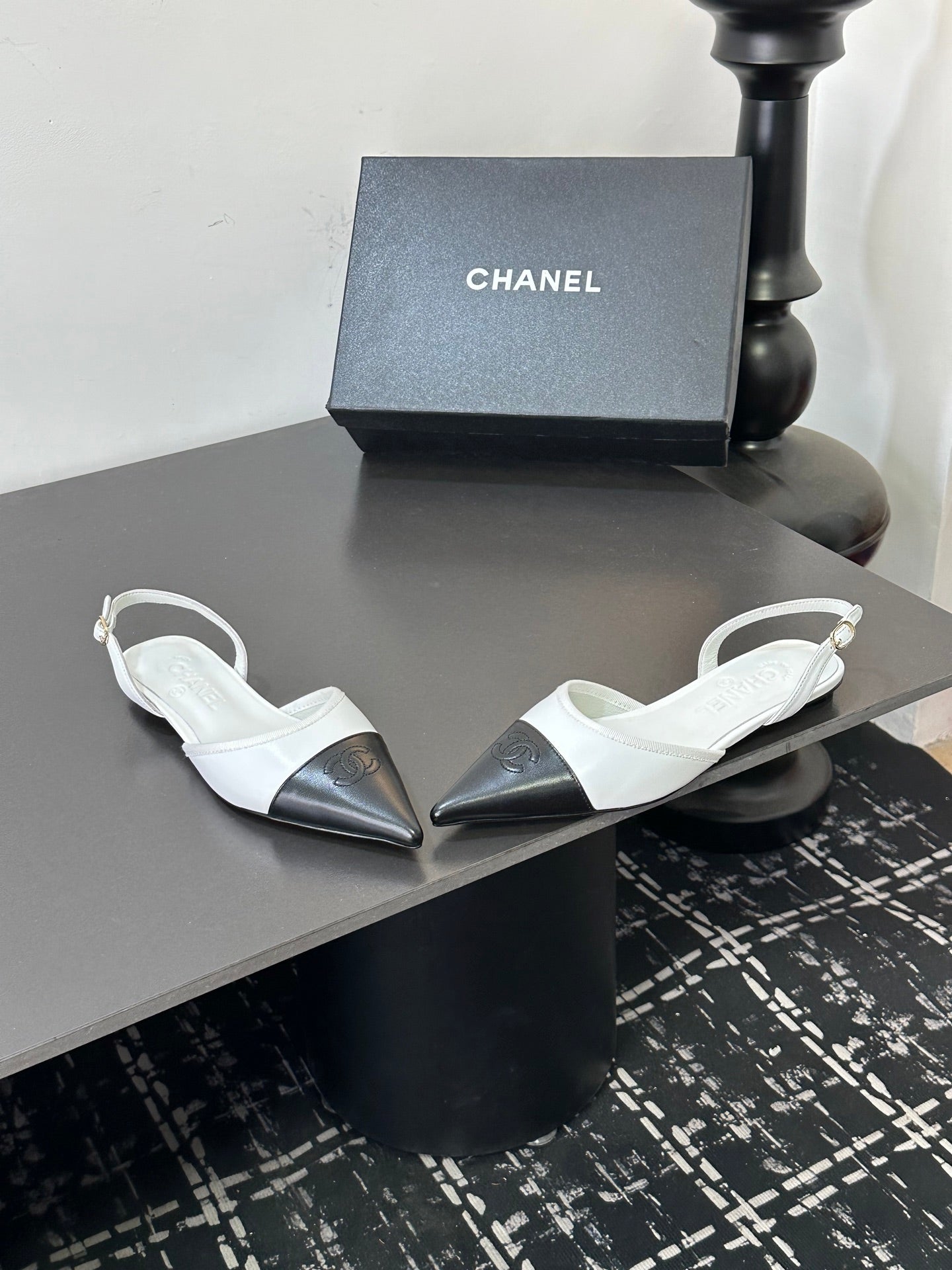 CHANEL 26S POINTED-TOE SLINGBACKS IN WHITE AND BLACK LAMBSKIN
