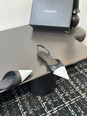 CHANEL 26S SLINGBACK FLATS IN BLACK AND WHITE LAMBSKIN