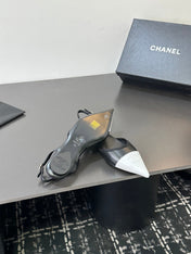 CHANEL 26S SLINGBACK FLATS IN BLACK AND WHITE LAMBSKIN